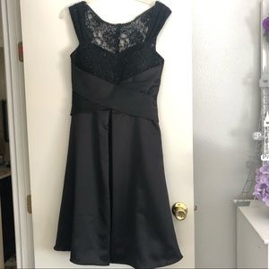 Formal little black dress with beaded top